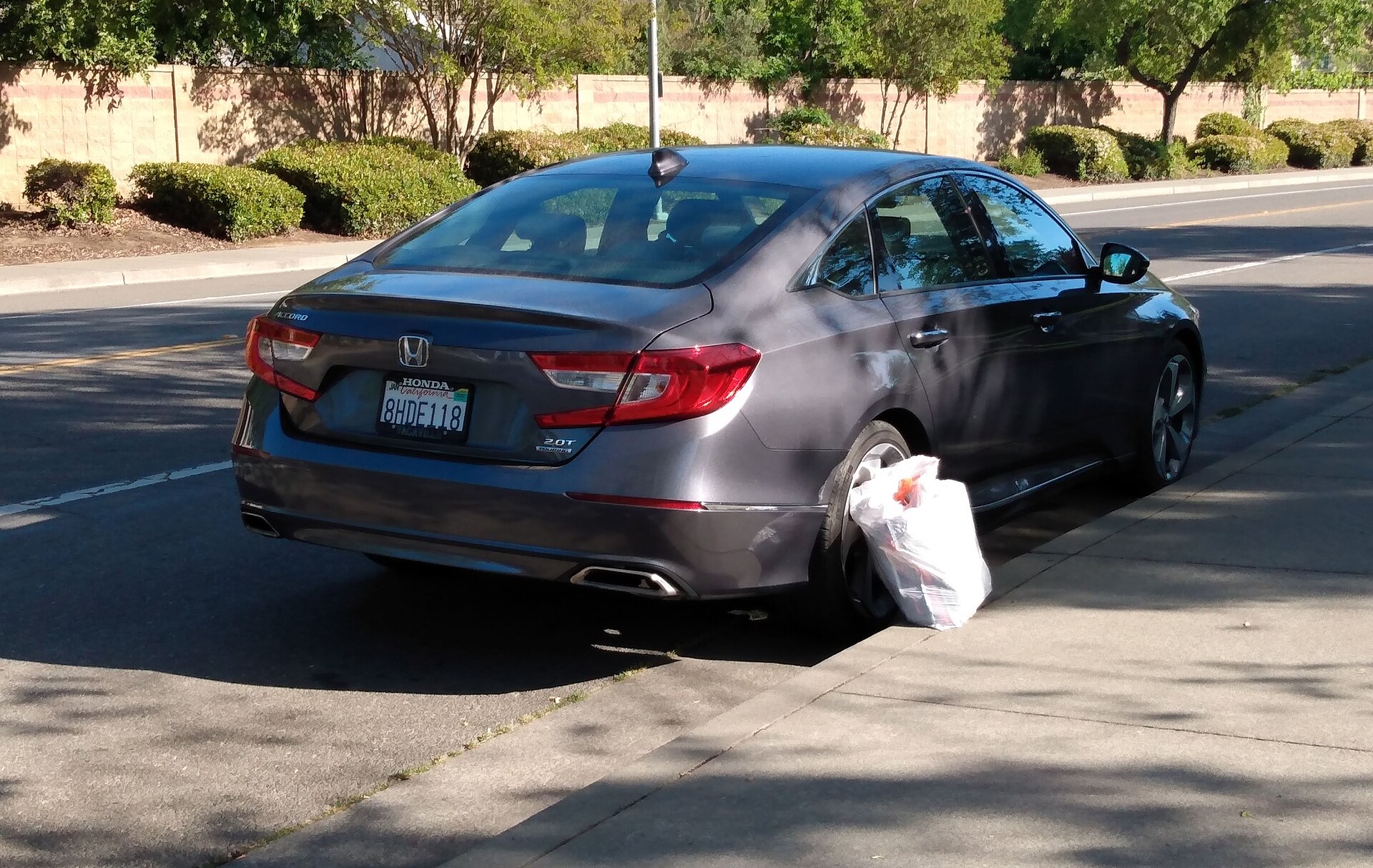 2018 Honda Accord Touring sedan photographed outdoors.