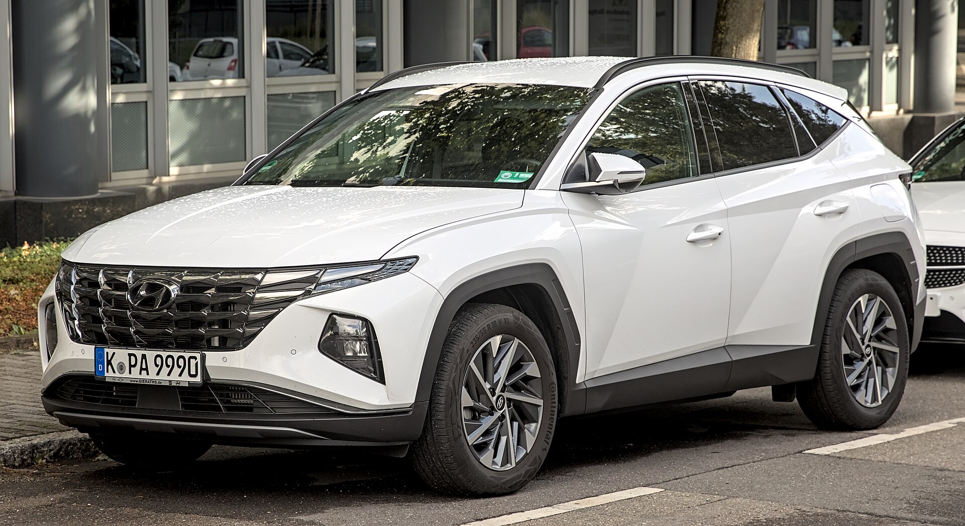 Hyundai Tucson NX4 compact SUV photographed outdoors.